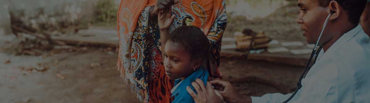 Doctor treating child