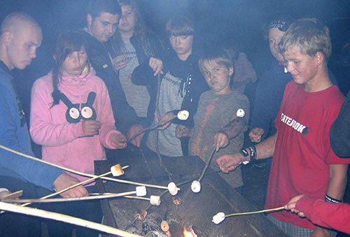 Kids roasting marshmallows